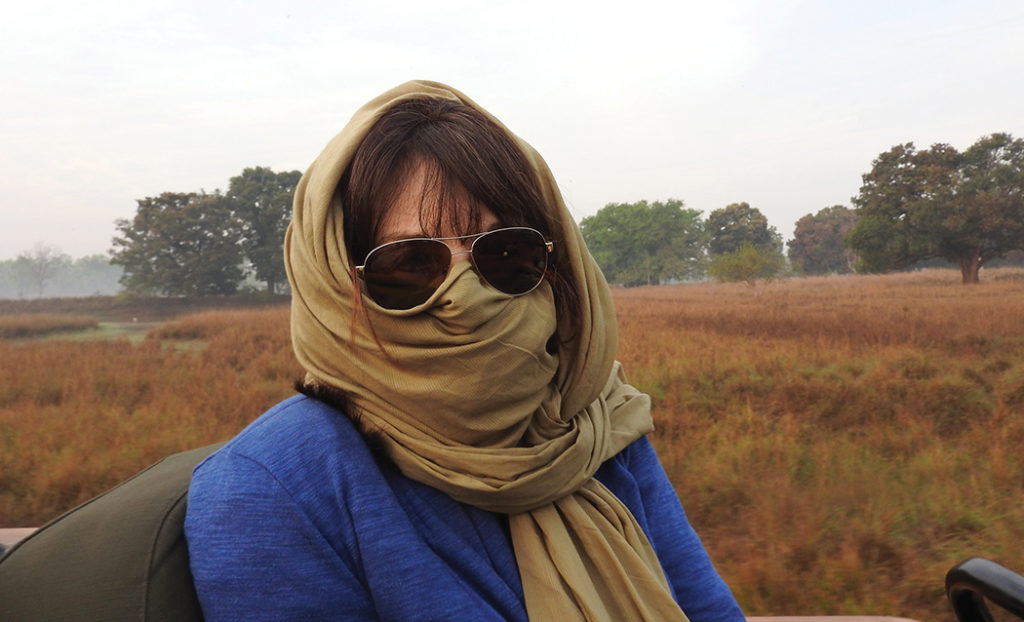 The author, Pepper Edmiston, protects herself from the air in India.