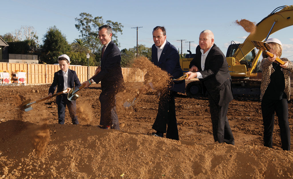 Palisadians Gavin Alexander (left) and Sophie Herron (right) joined Mayor Eric Garcetti, developer Rick Caruso and L.A. City Councilmember Mike Bonin for the official Palisades Village groundbreaking ceremony on Swarthmore on October 28. Photo: Bart Bartholomew