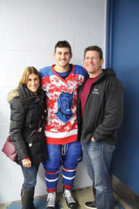 Dana and Rick Rivera with son Luke, who plays for the Fredonia Blue Devils.